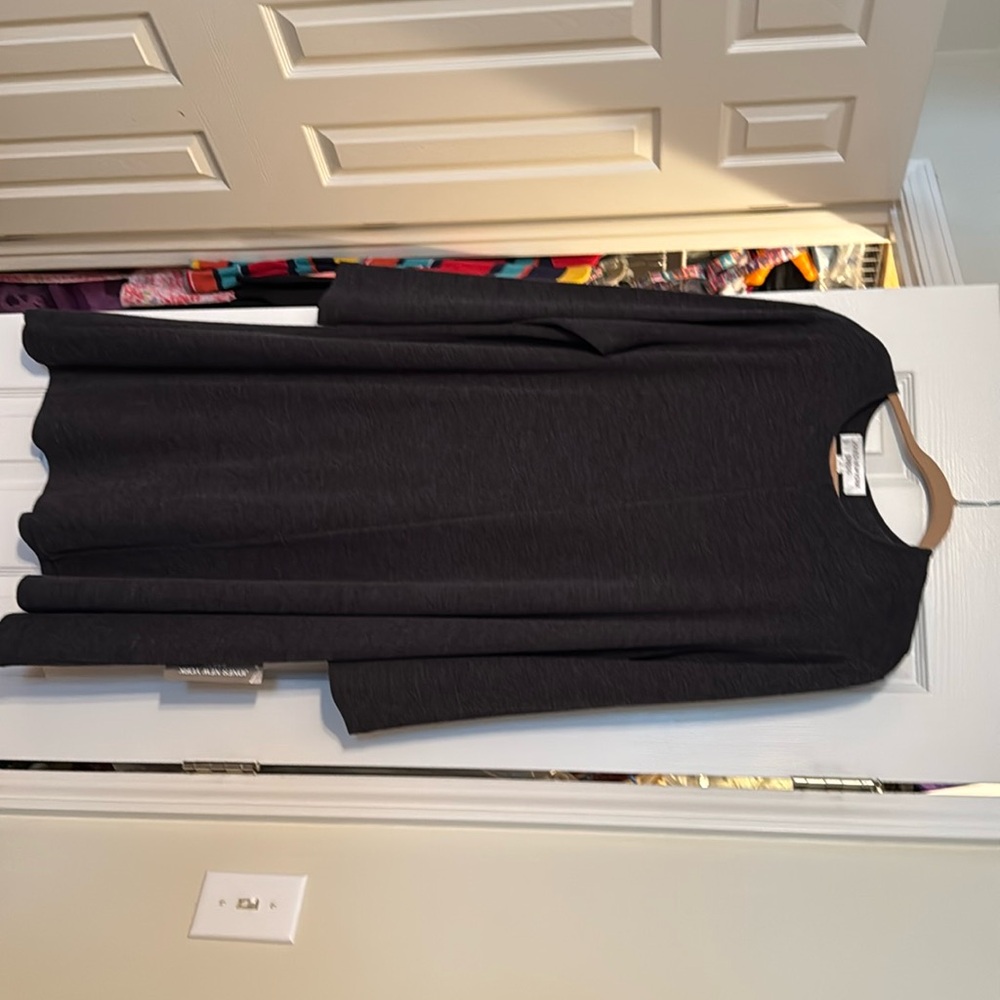 Grey dress with shoulder pads. Perfect fall to winter dress. New with tags